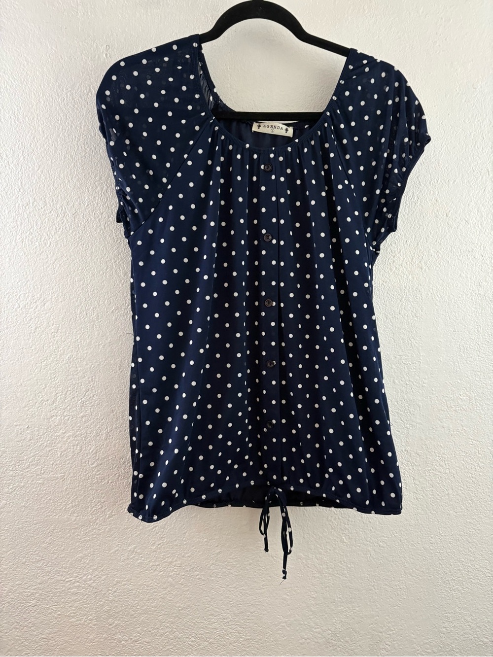 Agenda brand top is a navy blue blouse white polka dot pattern drawstring hem L